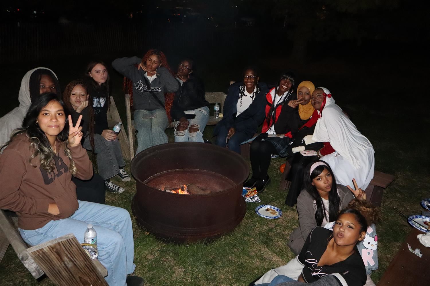 students by a fire