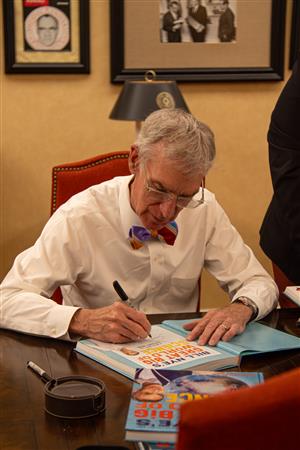 Bill Nye signing books