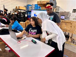 female students working at computer