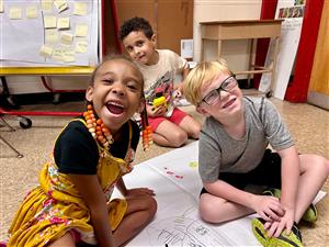kids smiling at camera